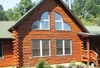 Log Home sealed with TWP log and siding.