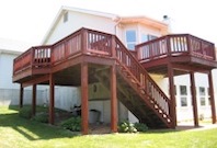 Cedar deck sealed with TWP 103 Redwood.