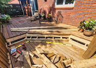 Deck with wrap around step being rebuilt.