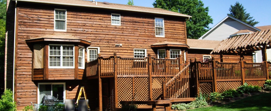 Cedar sided home preserved with a natural wood preservative