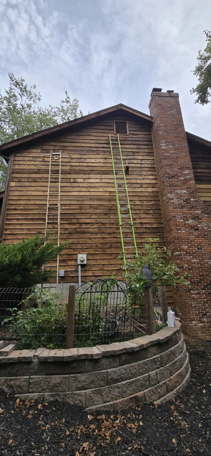 Cedar siding after stripping and preparation with some old finish still visible