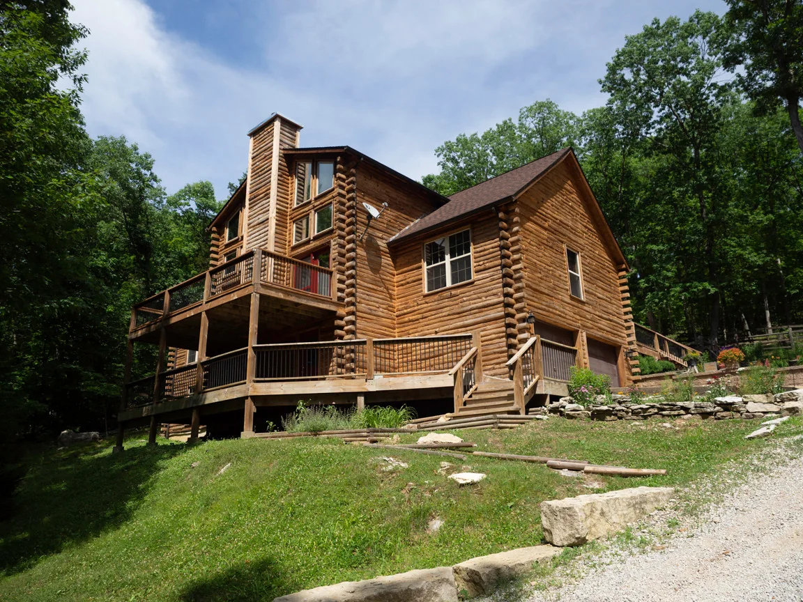 Large log home before restoration